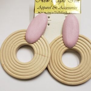 Earrings by: New light ink apparel and accessories